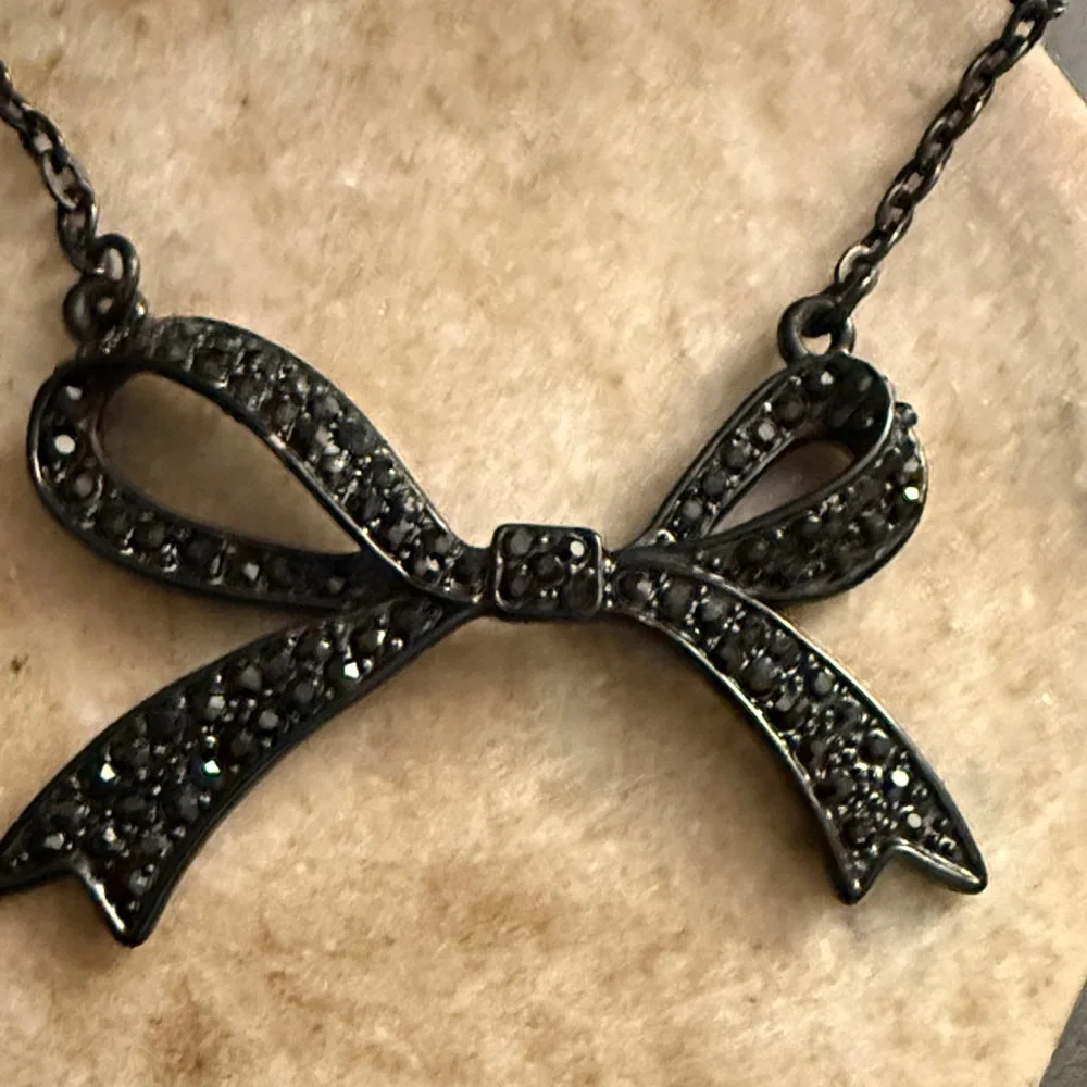 Gunmetal hematite-toned necklace a Bow Statement Vintage pendant &BLK Rhinestone